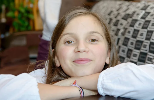 Young teenager lying on the sofa — Stock Photo, Image