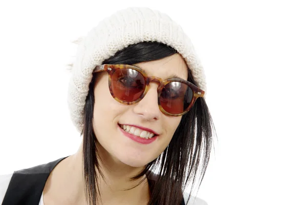 Portrait of a pretty young brunette with winter hat, on white — Stock Photo, Image