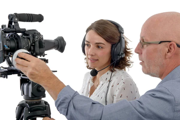 Young woman cameraman and the mature man — Stock Photo, Image