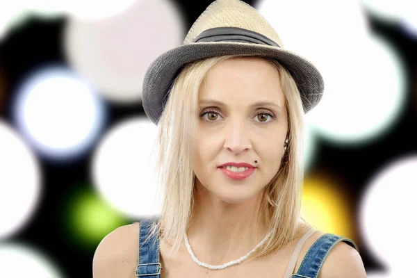 Beautiful blond woman  posing with summer hat — Stock Photo, Image