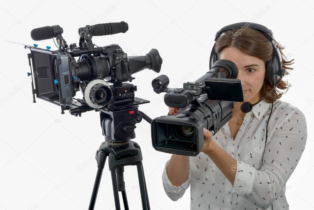 pretty young  girl with  professional camcorder, on white