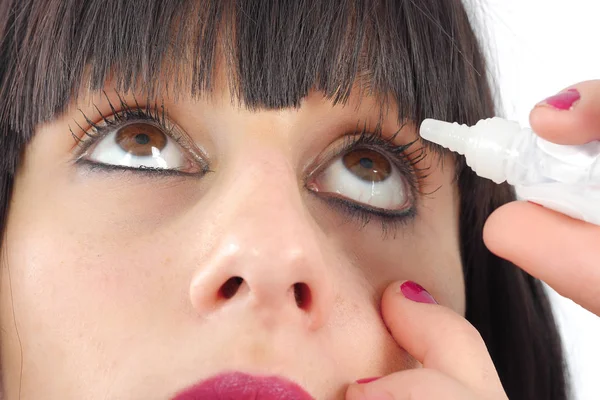 Closeup view of woman applying eye drop — Stock Photo, Image