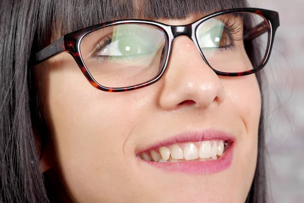 Zbliżenie: woman oko okulary — Zdjęcie stockowe