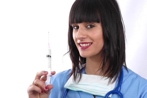 Young smiling female doctor with syringe on white — Stock Photo, Image