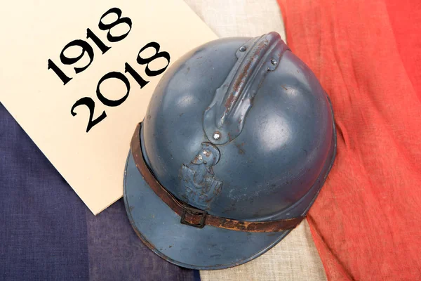 French military helmet of the First World War on red white blue — Stock Photo, Image