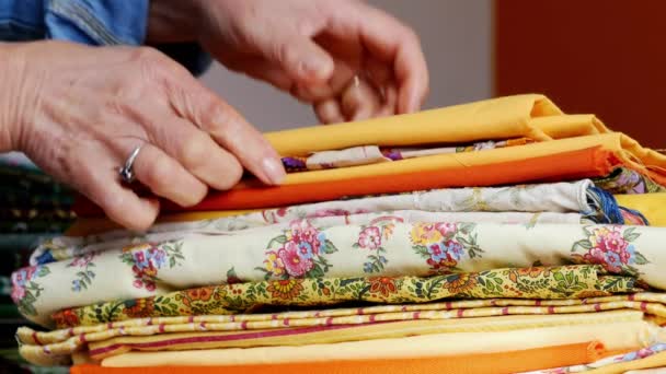 Close-up of the hands of a dressmaker — Stock Video