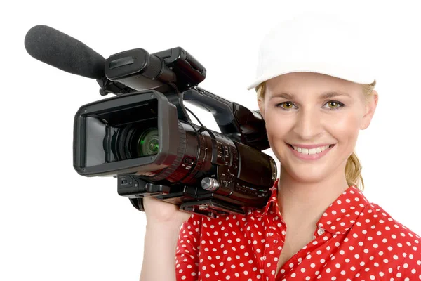 Jeune femme blonde avec caméscope professionnel, sur blanc — Photo