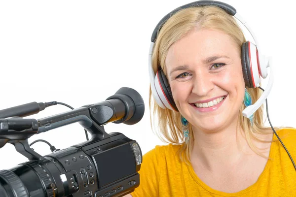 Blond young woman with professional video camera, on white — Stock Photo, Image