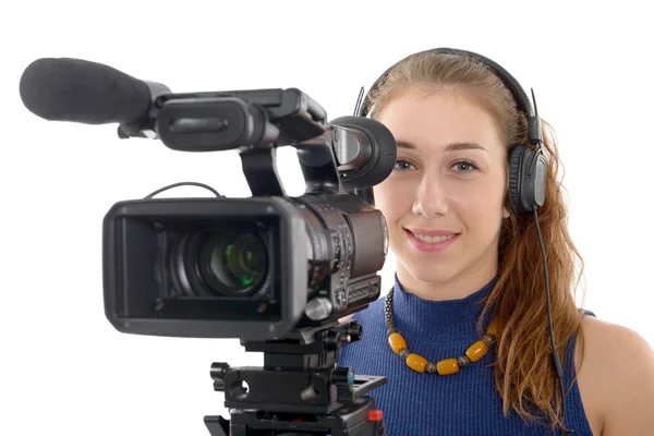 Beyaz zemin üzerinde bir video kamera ile genç kadın — Stok fotoğraf