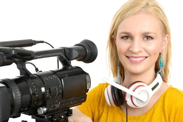 Blond young woman with professional video camcorder, on white — Stock Photo, Image