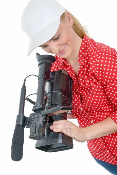 sarışın genç kadın beyaz üzerine profesyonel video kamera ile