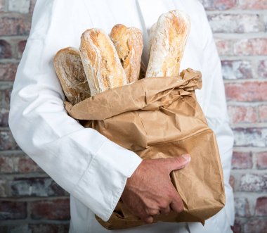 baker geleneksel ekmek holding Fransız baget