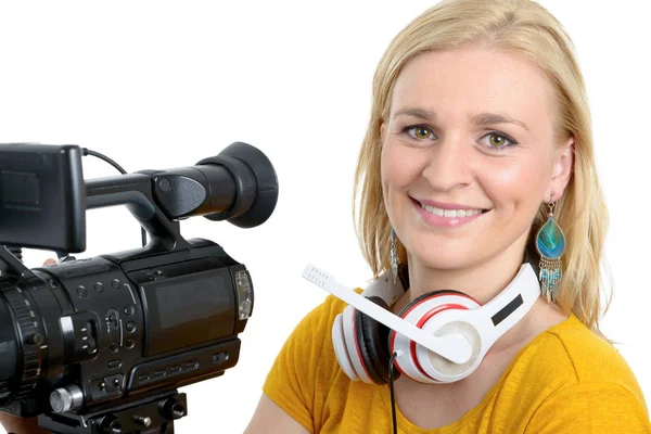 Blond young woman with professional video camera, on white — Stock Photo, Image