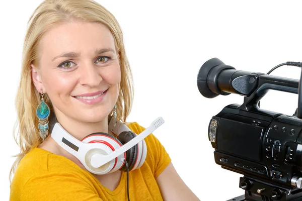 Blond young woman with professional video camera, on white — Stock Photo, Image