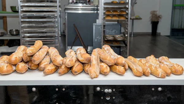 French breads taken out of the oven — Stock Photo, Image