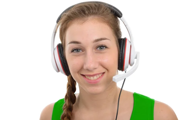 Mooie jonge vrouw met een headset, op witte glimlachen — Stockfoto