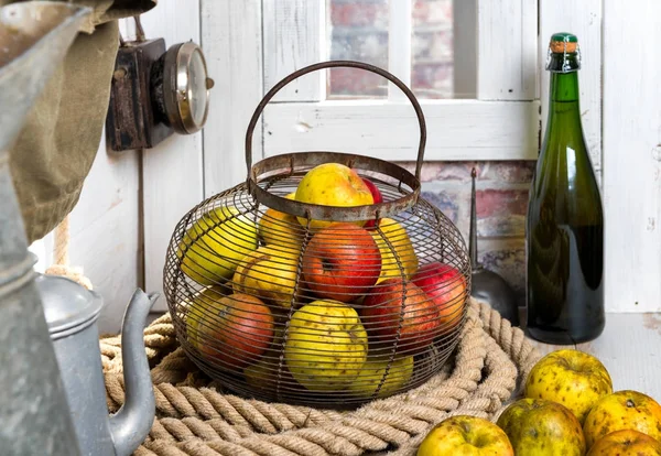 Organic fresh apples with bottle of Normandy cider — Stock Photo, Image