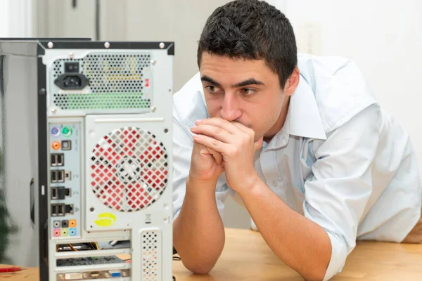 Young technician have a problem with computer — Stock Photo, Image