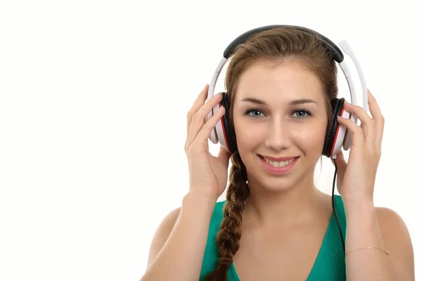 Woman with headphones listening to music - isolated — Stock Photo, Image