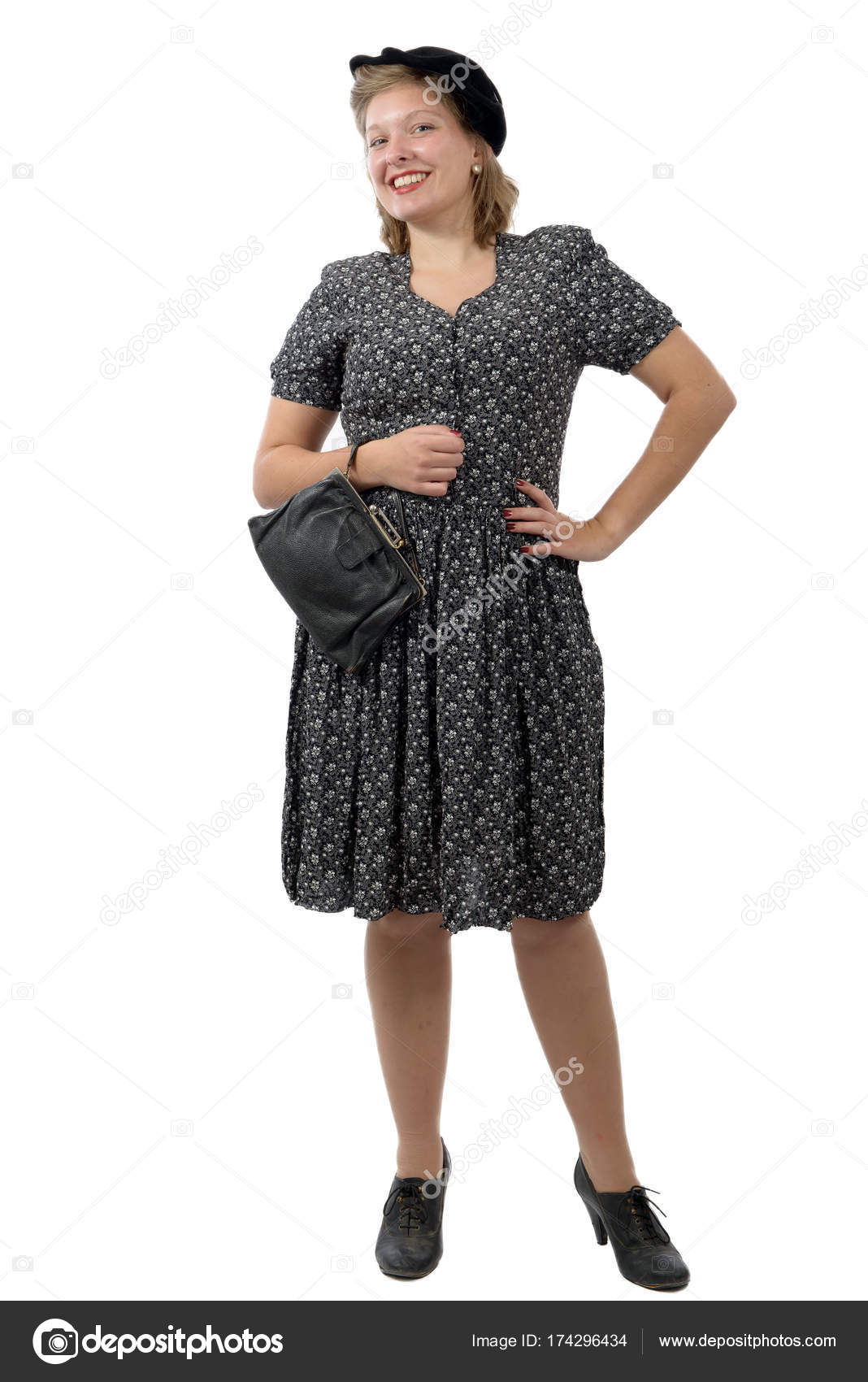 Hübsche Frau mit Klamotten im Stil der 1940er Jahre ...