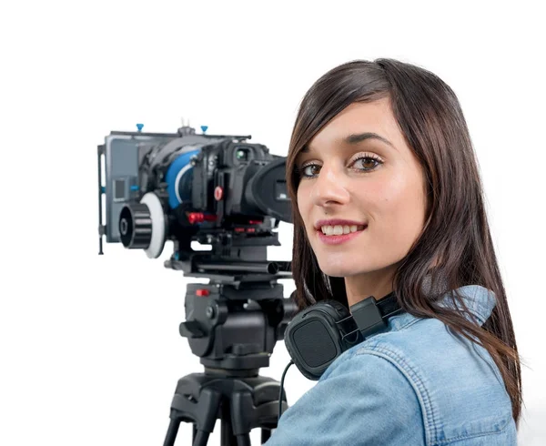 Dslr video kamera ve kulaklık ile güzel genç kadın