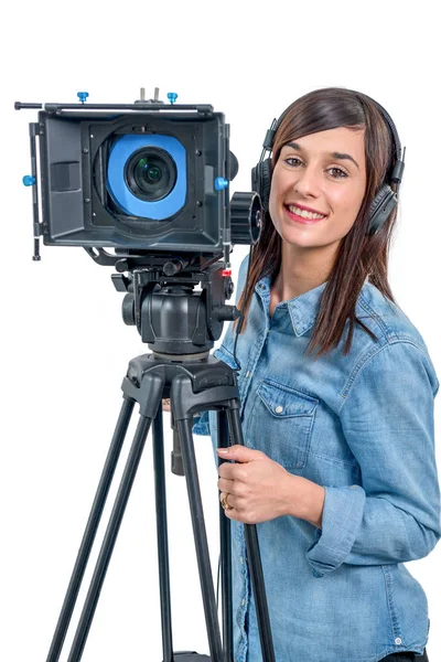 Dslr video kamera ve kulaklık ile güzel genç kadın