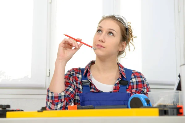 Portrait of young woman apprentice carpenter — Stock Photo, Image