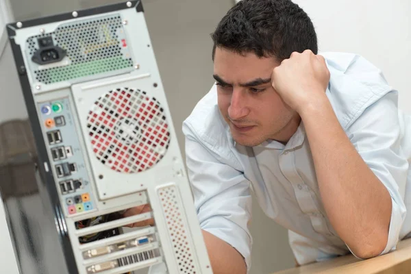 Young technician have a problem with computer — Stock Photo, Image