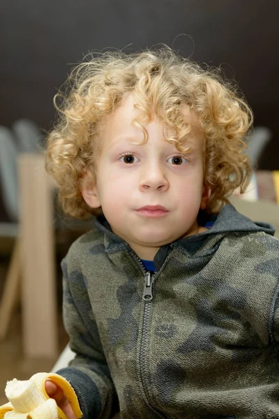 Portrait of young blond curly boy — Stock Photo, Image