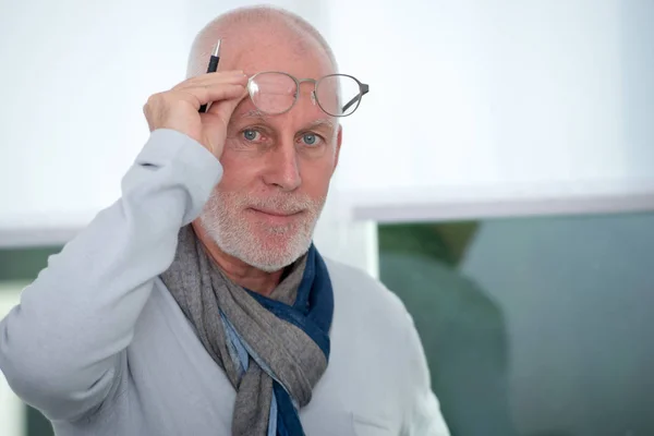 Portrait of mature man with glasses — Stock Photo, Image