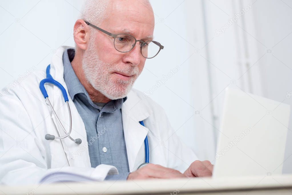 portrait of medical doctor with stethoscope