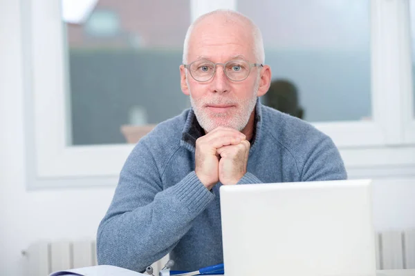 Portrait of mature man with white hair at home — Stock Photo, Image