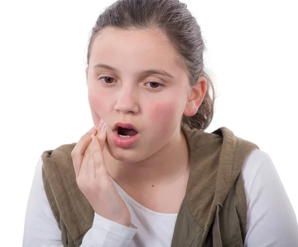 Adolescente ha un mal di denti su sfondo bianco — Foto Stock