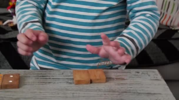 Young Boy Two Years Old Playing Domino Game — Stock Video