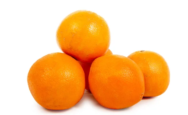 Pile of ripe oranges isolated on white background — Stock Photo, Image