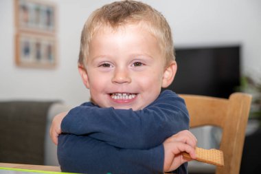 portrait of smiling two year old boy