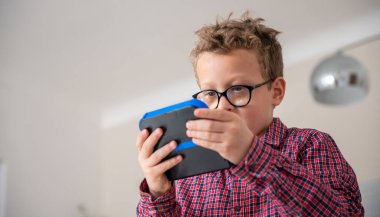 child boy playing video game