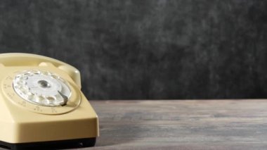vintage beige old plastic telephone 