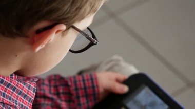 child boy playing video game