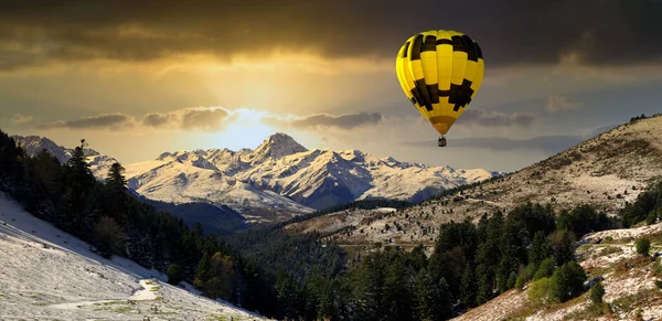 hot air balloon with mountains Pic du Midi de Bigorre, french Pyrenees