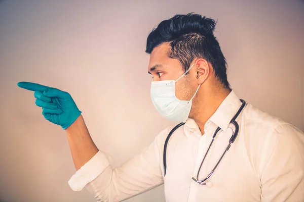 doctor with mask and gloves against coronavirus