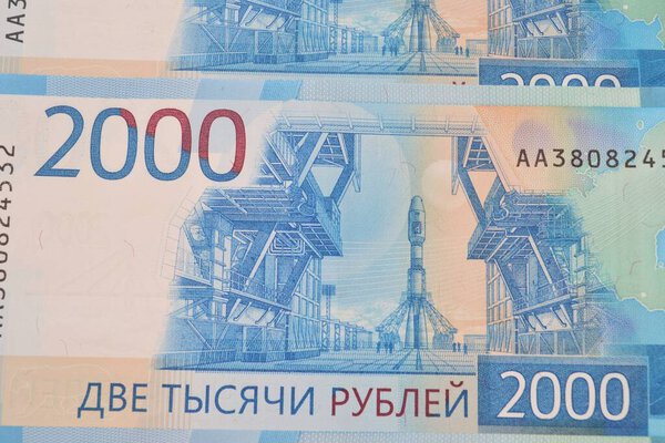 RUSSIA,TOPKI-SEPTEMBER 30, 2018. Banknotes Russia 2000 roubles closeup,background.Vostochny space launch centre