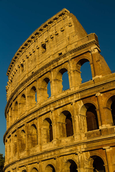 The Colosseum or Coliseum Roman Amphitheatre in late afternoon or evening
