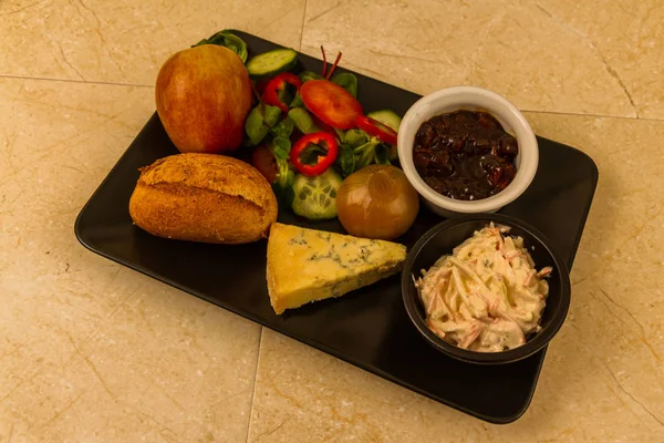 Pflüger-Mittagessen mit Stelzenkäse. — Stockfoto