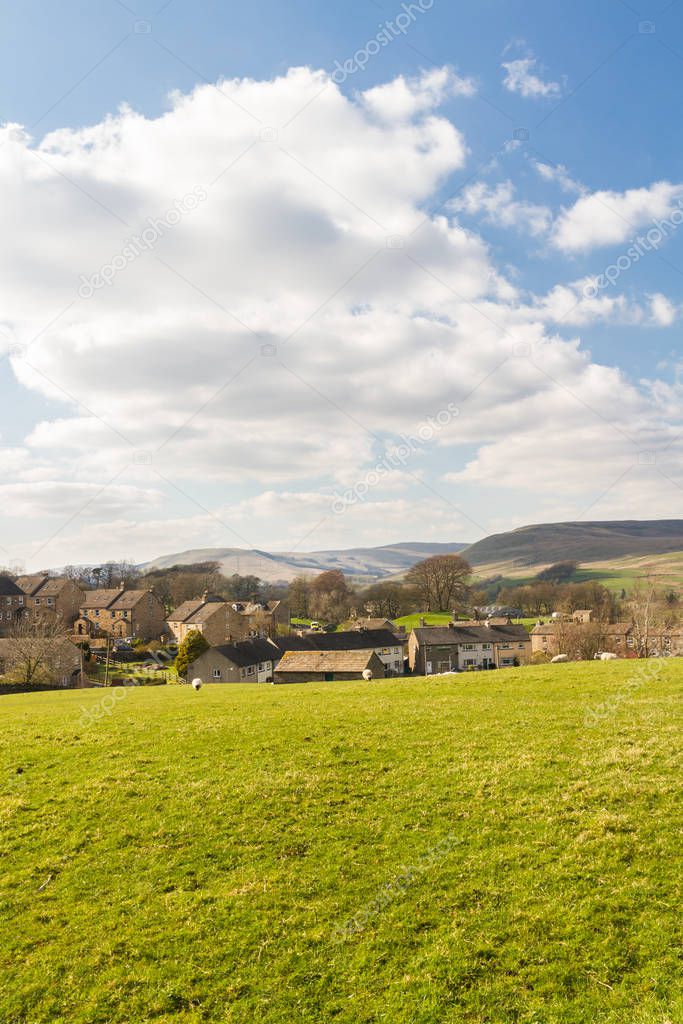 Yorkshire Dales, England, view towards stone cottage village