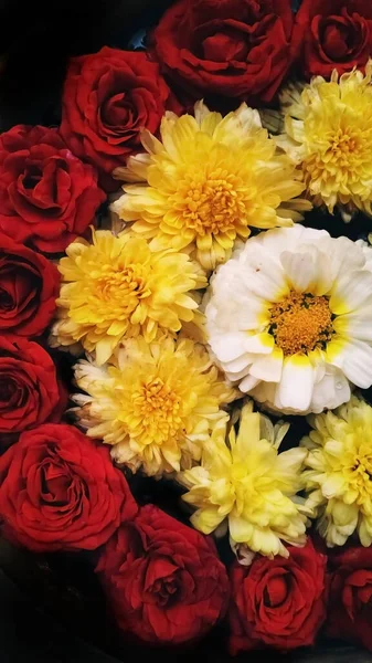 Indian flower decoration in holy water. It's a Hindu religion to pray to the god with the beautiful flower decoration