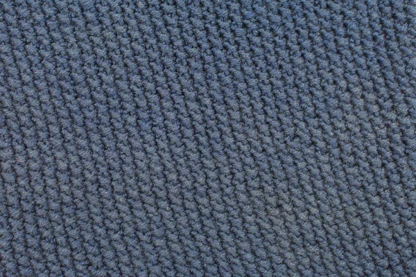 Игровая работа, хобби, вязание. Фон текстильная ткань с трикотажной текстурой шерсти синий. Трикотаж в качестве фона . — стоковое фото