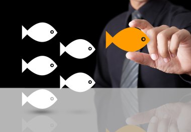 Goldfish showing leader individuality success concept clipart