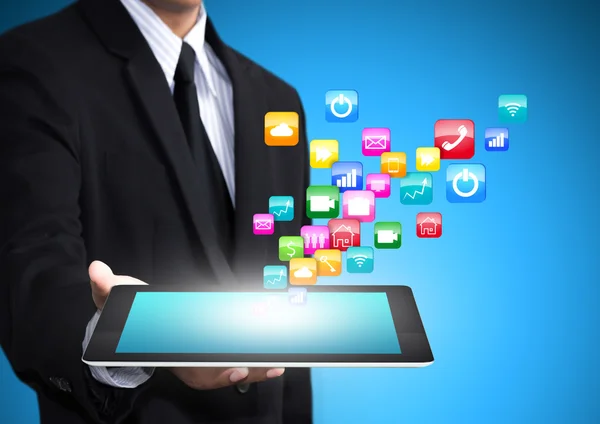 Tablet de tela sensível ao toque com nuvem de ícones de aplicativos coloridos — Fotografia de Stock