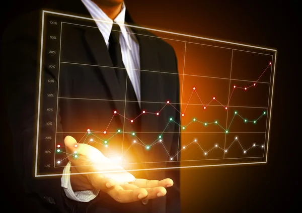 Business man hand touching a chart on screen — Stock Photo, Image